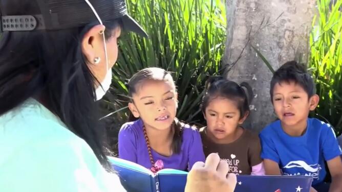 Traffic lights become classrooms for homeless children